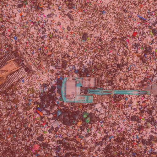 Garbage pile  in trash dump or landfill, Aerial view garbage trucks unload garbage to a landfill,  global warming.